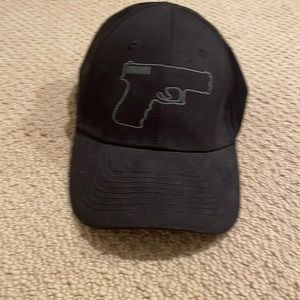 black hat with gun detail in front